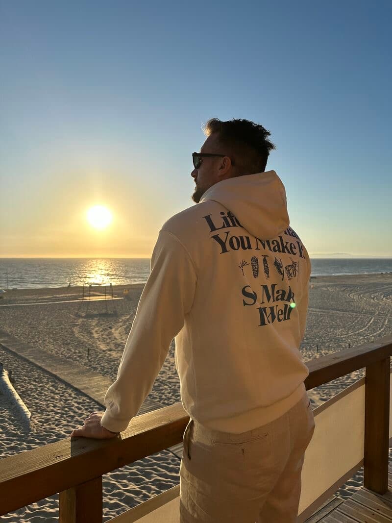 Alexandre Hernandez, co-founder of Jobgether, enjoying a beach sunset, representing remote work lifestyle, freedom, and work-life balance.