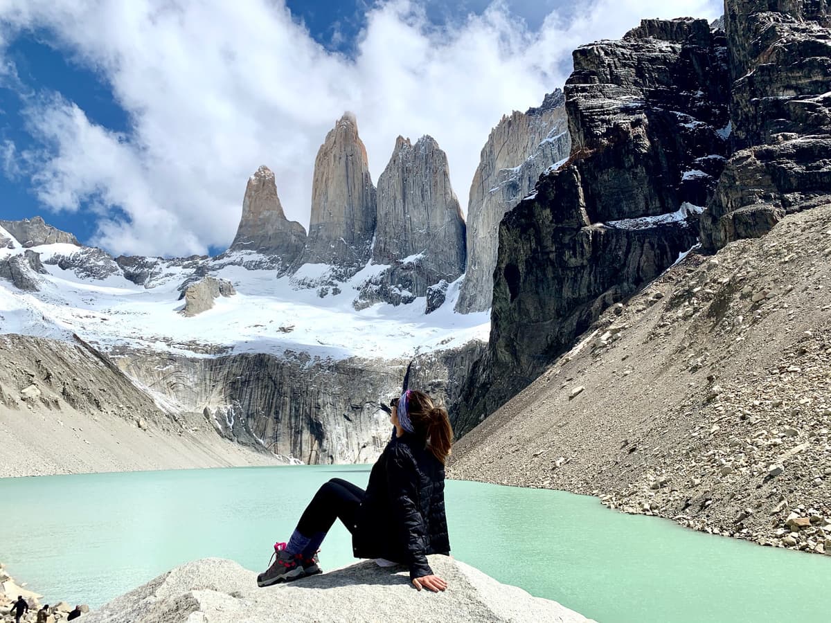Kristin Vierra hiking in Torres del Paine, Patagonia, Chile during her digital nomad travels.