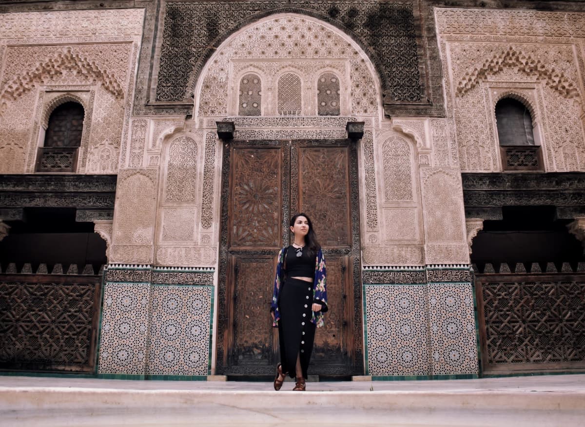 Global PR strategist Alexia de Souza at a historic Moroccan palace exploring cross cultural communication.