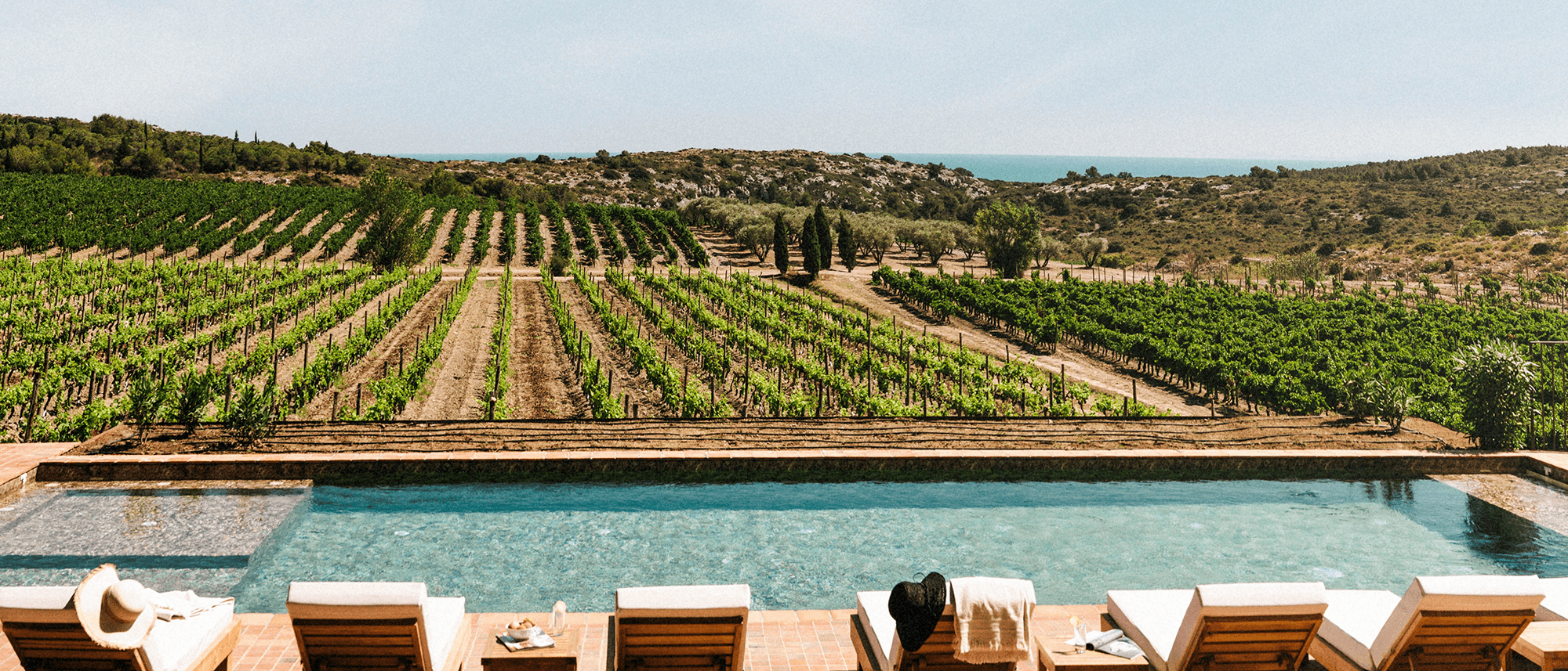 French vineyard team retreat venue with pool and ocean views for remote work offsites