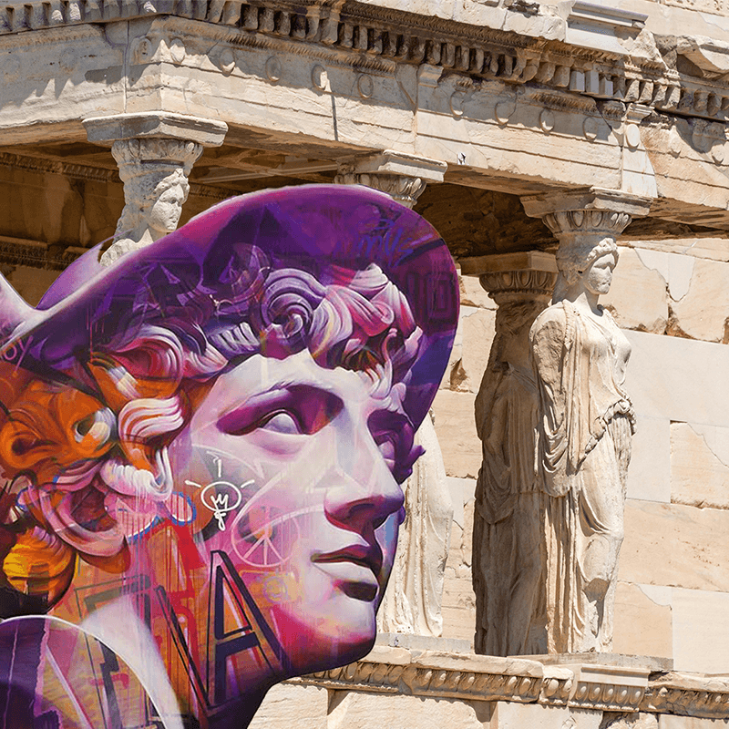 A painted classical bust beside the caryatids, storytelling stop on a PR team retreat