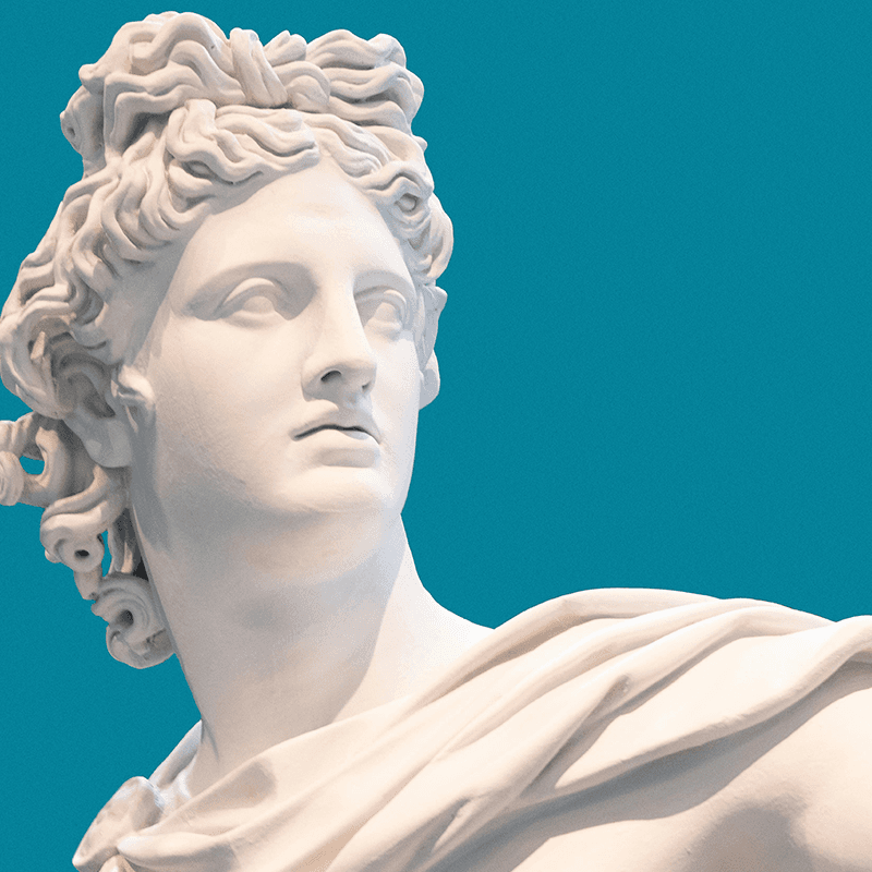 A Greek muse in white marble against blue, the storytelling motif of a communication team retreat