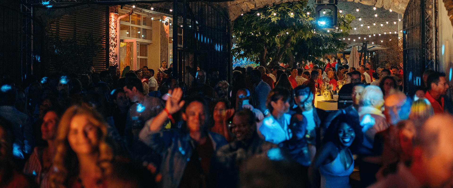 A startup team dancing at the milestone party, the last night of a scale-up team retreat