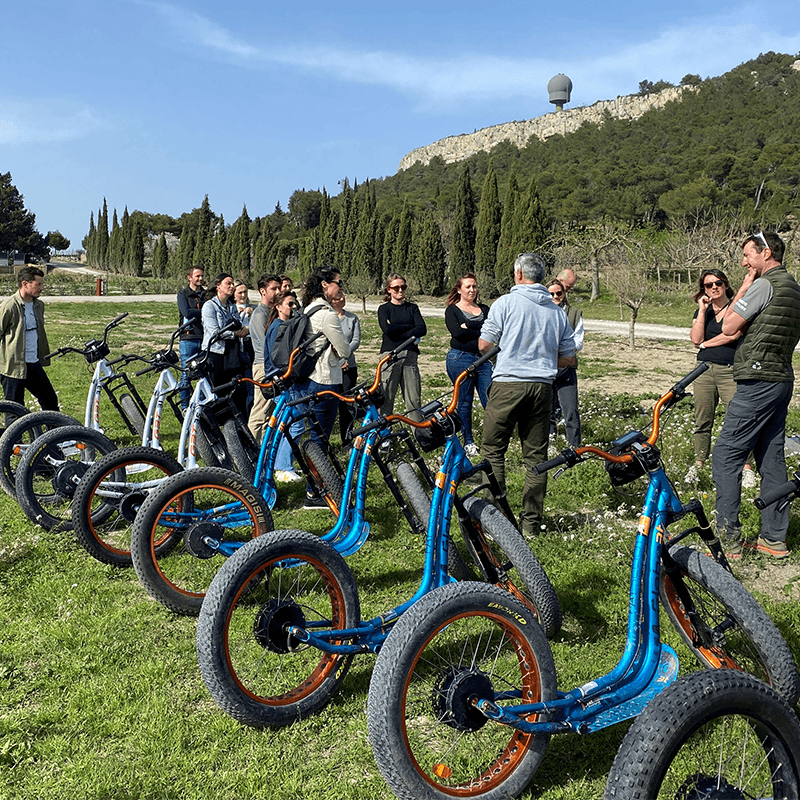 Briefing at the e-bikes among the cypresses, team activity on a company offsite in Provence