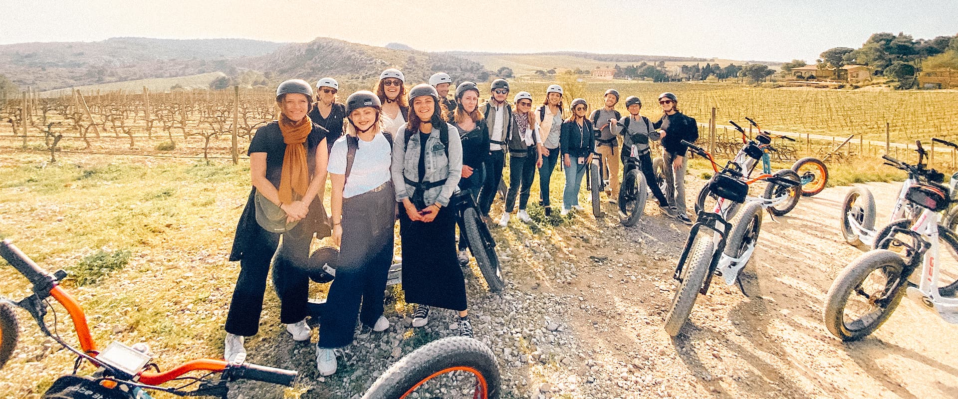 A team with e-bikes on a French country track, culture-sparks team retreat